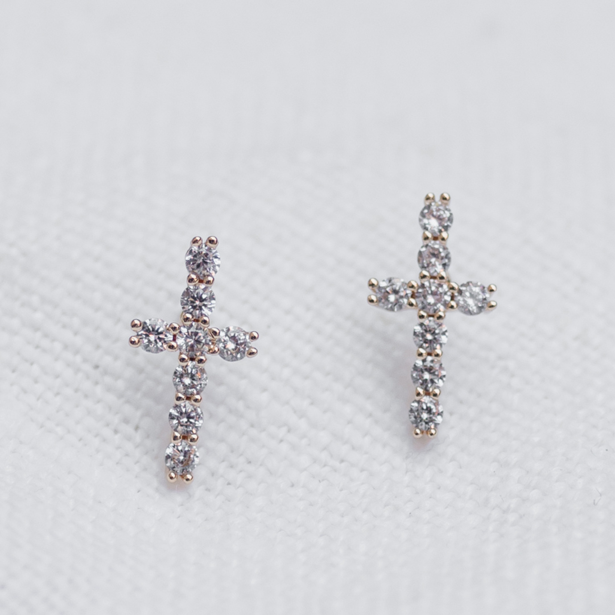 cross shaped studs with cubic zirconia