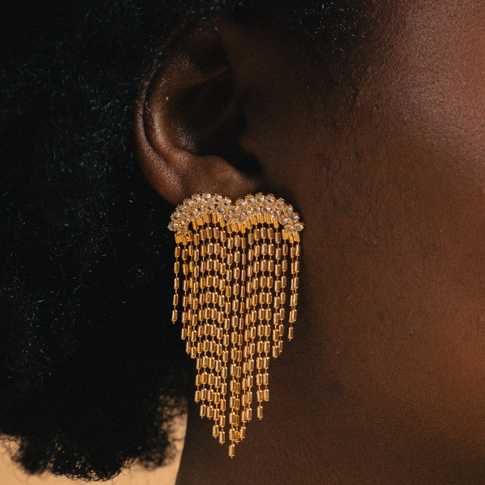 gold chain tassel earrings with cubic zirconia detail 