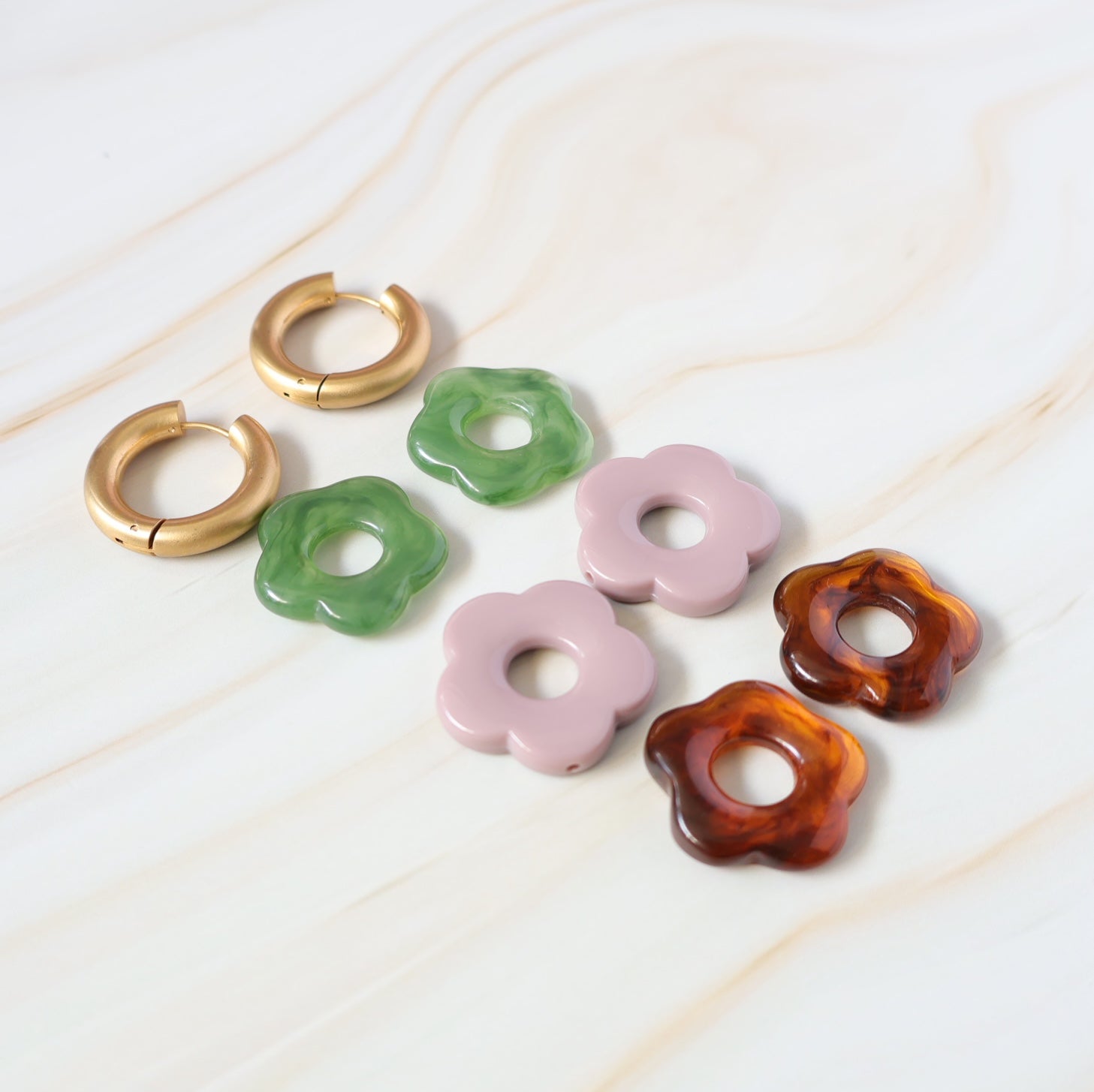 Gold hoops with interchangeable flower charms 