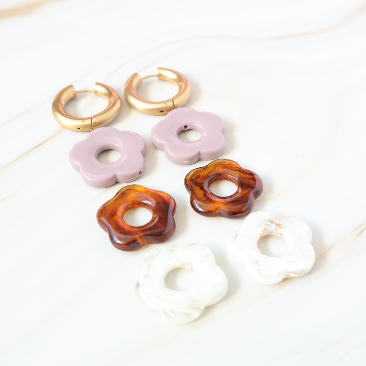 Gold hoops with interchangeable flower charms 