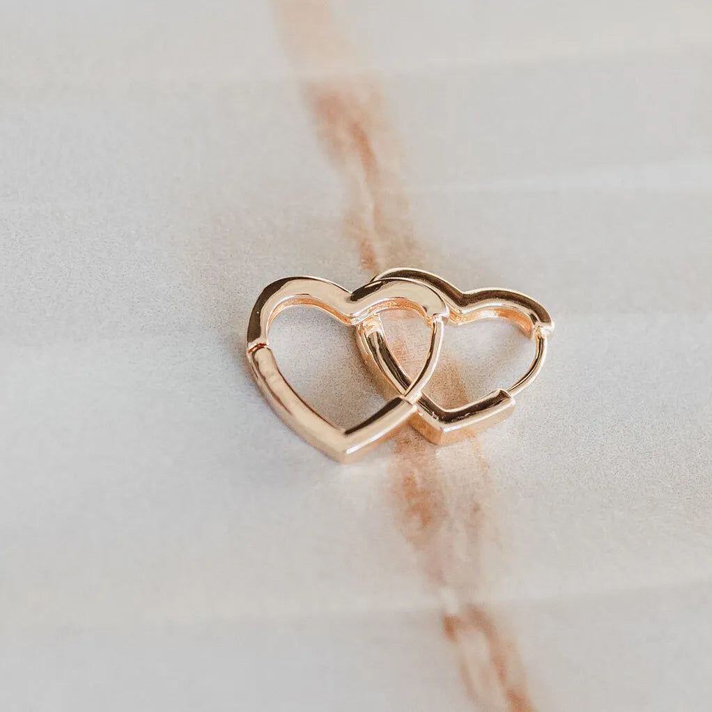 Gold heart shaped hoops