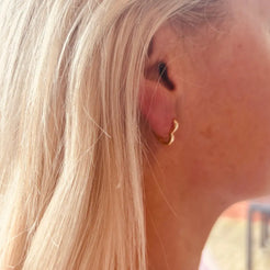 Gold heart shaped hoops