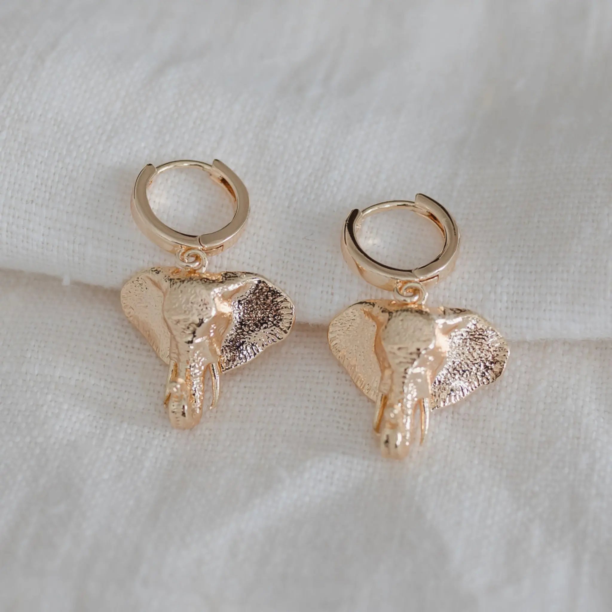 gold elephant head huggie hoop earrings