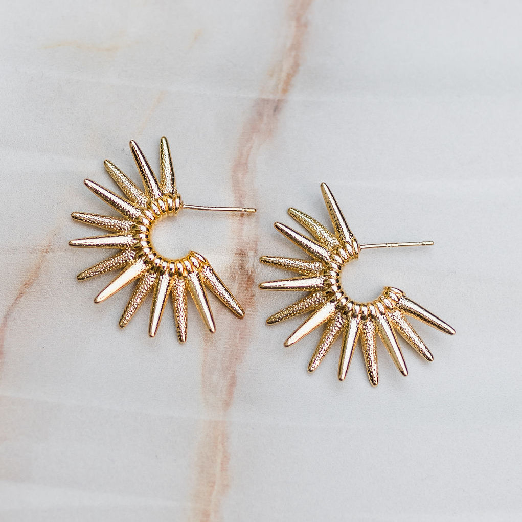 sun dial gold earrings 