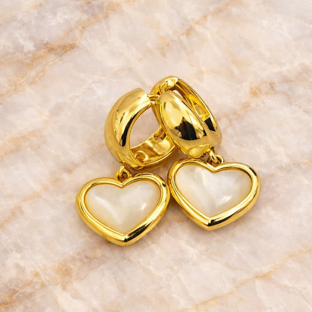 chunky gold huggie hoops with pearl heart drop 