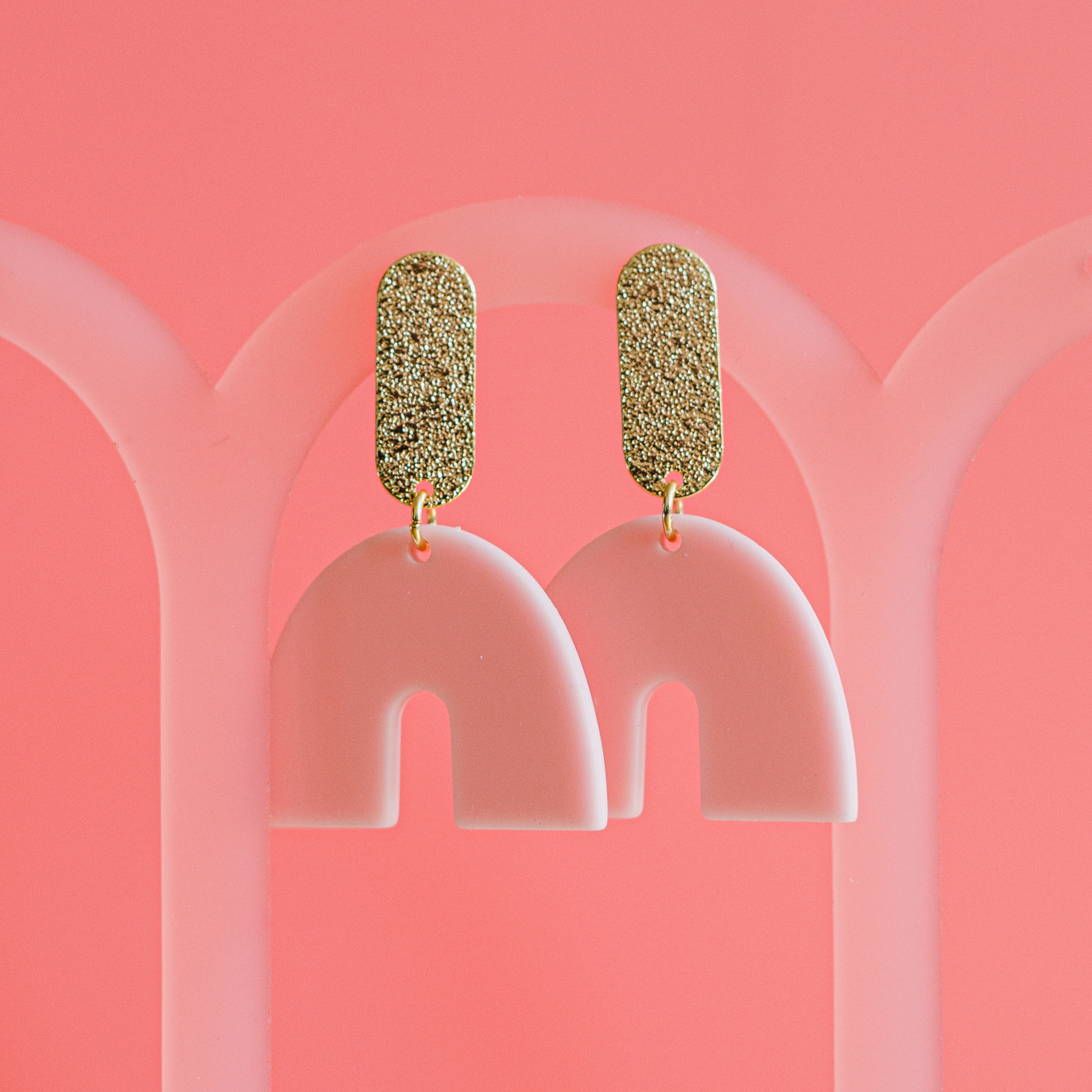 THE DEBS - Pastel Pink Arch Drop Earrings on Gold Bar