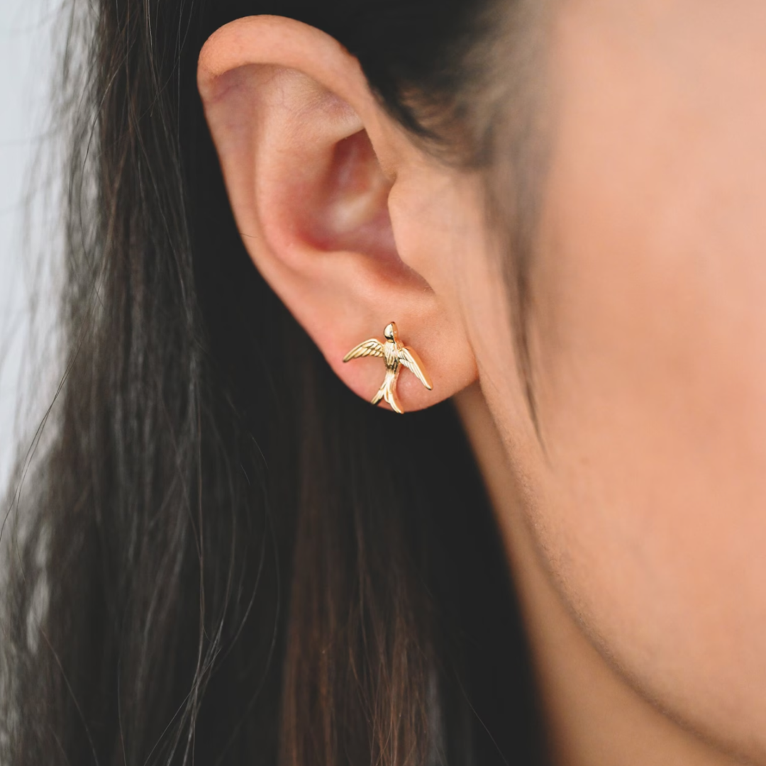 Gold swallow bird stud earring