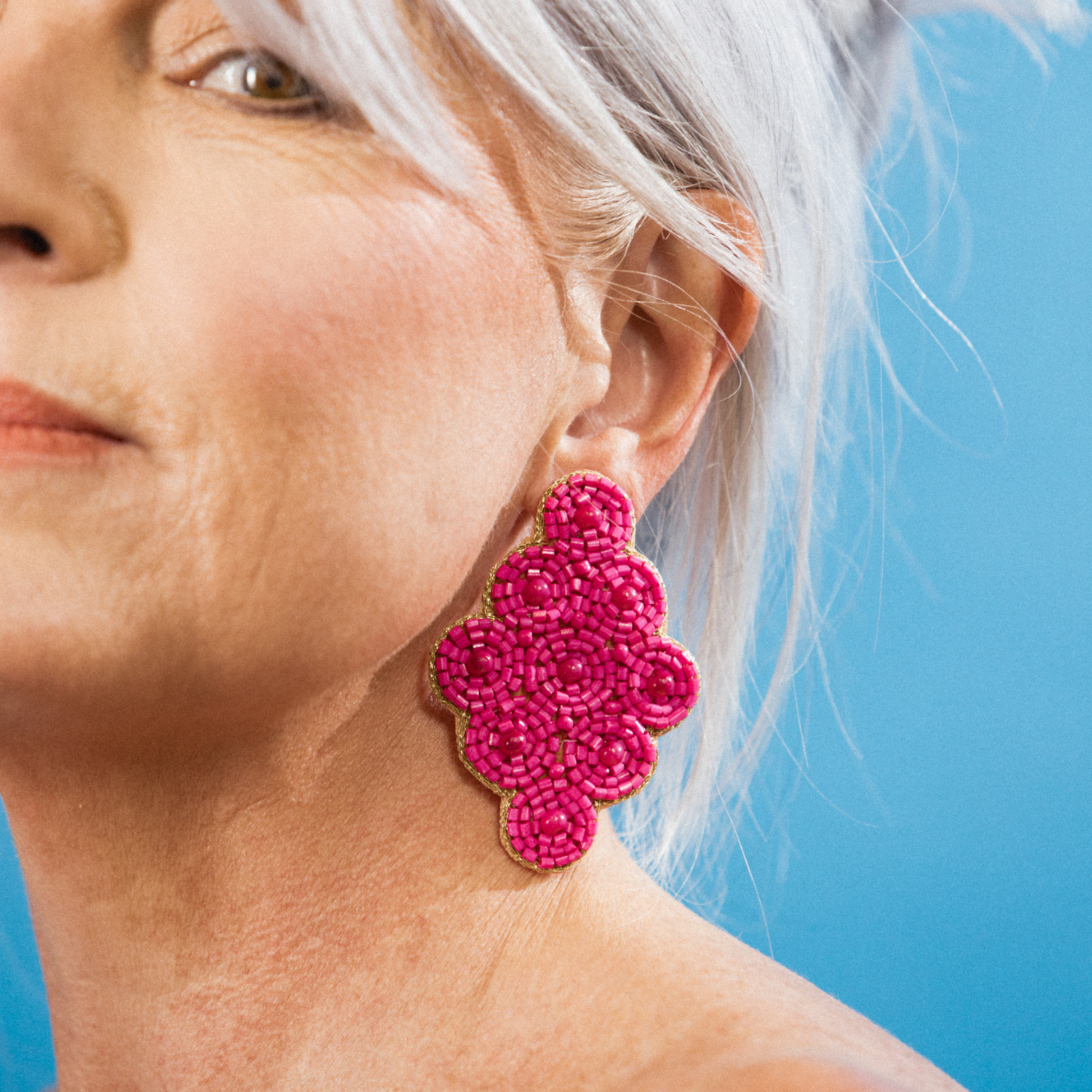 large pink beaded statement earrings