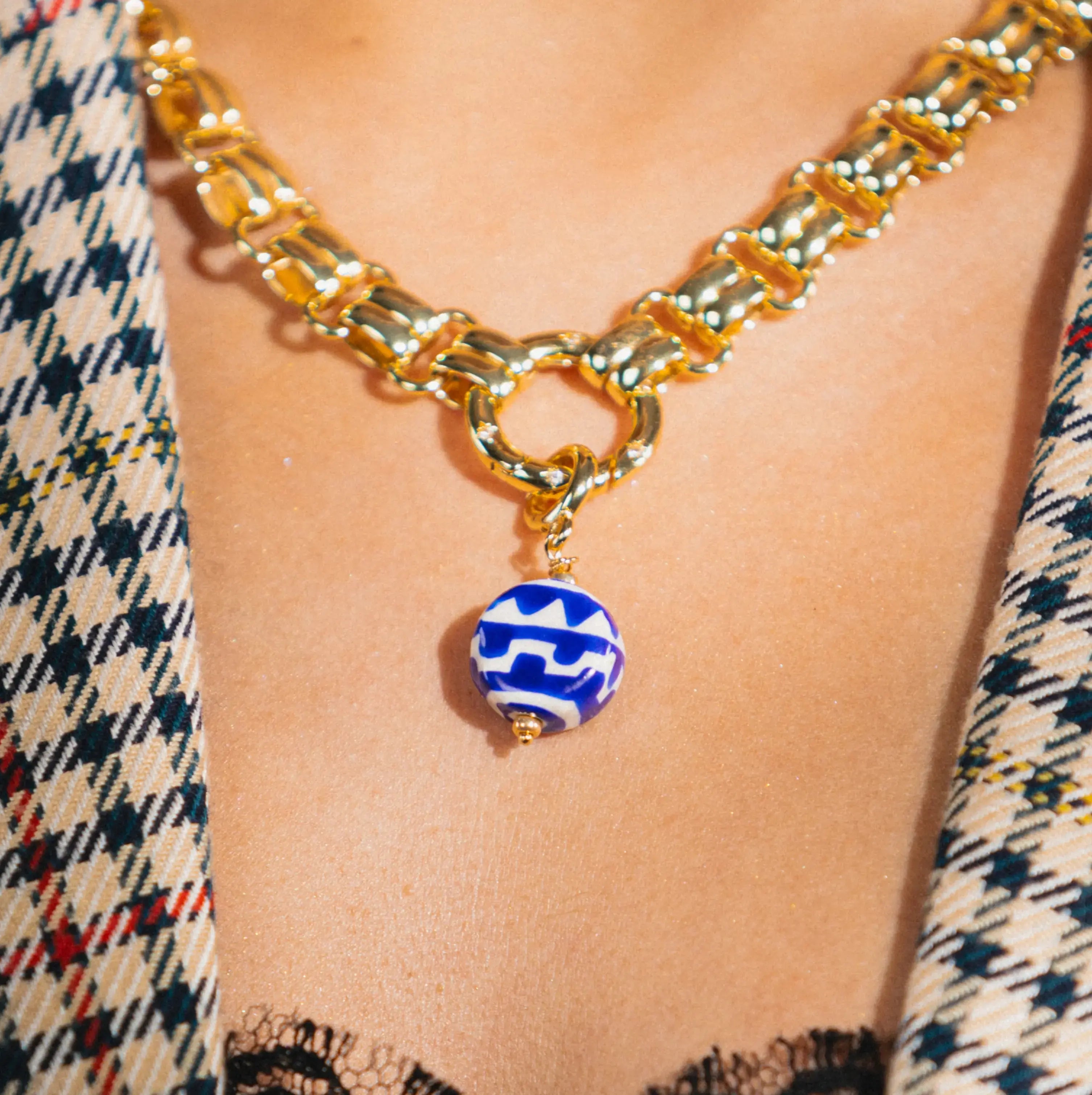blue and white ceramic necklace charm