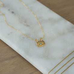 gold evil eye pendant necklace 