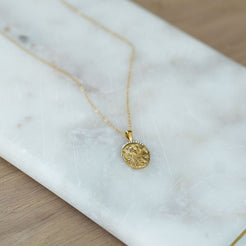 Gold floral pendant necklace 