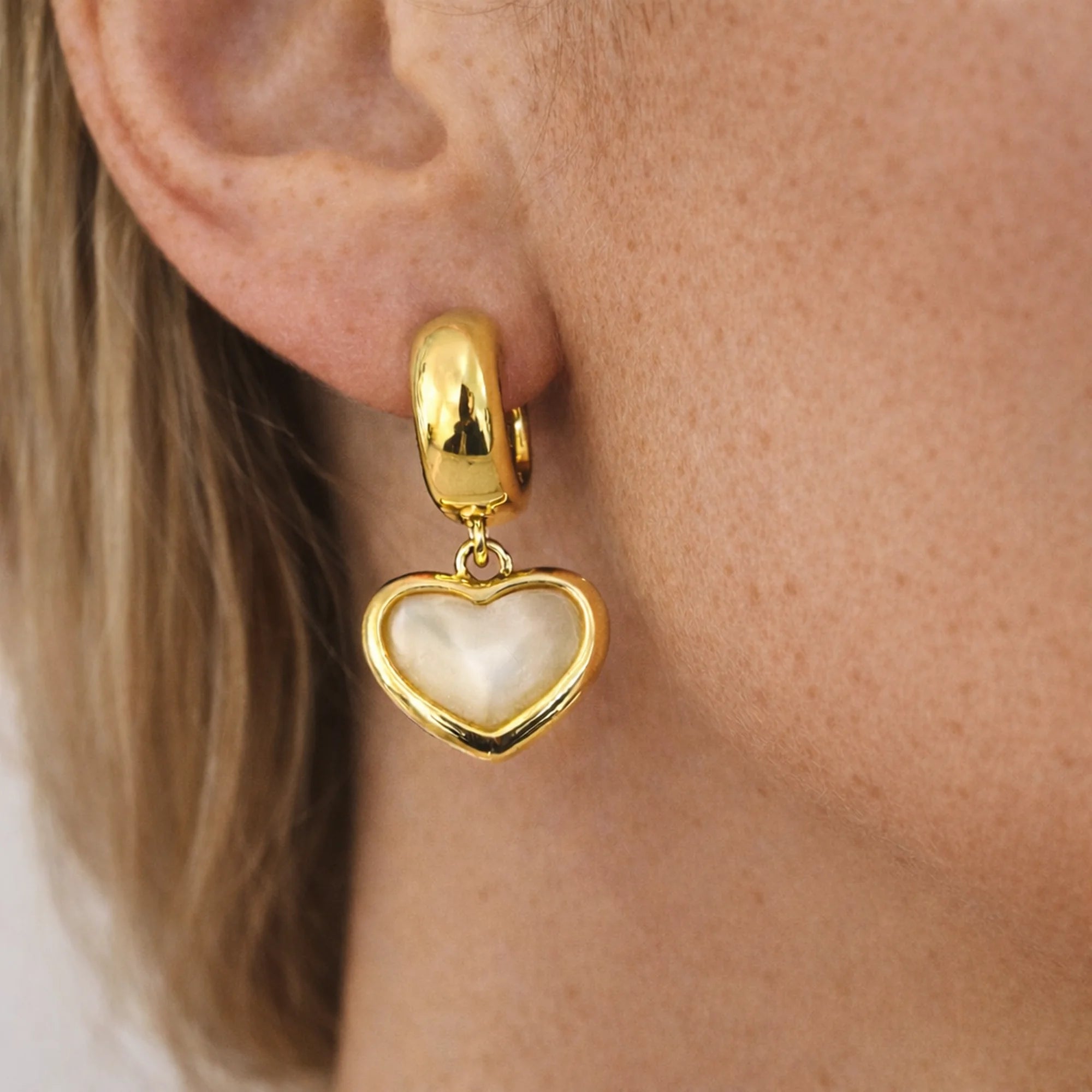 chunky gold huggie hoops with pearl heart drop 
