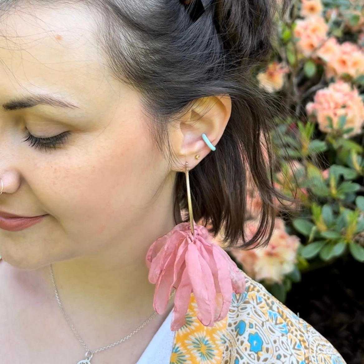 large gold hoops with pink petal earrings 