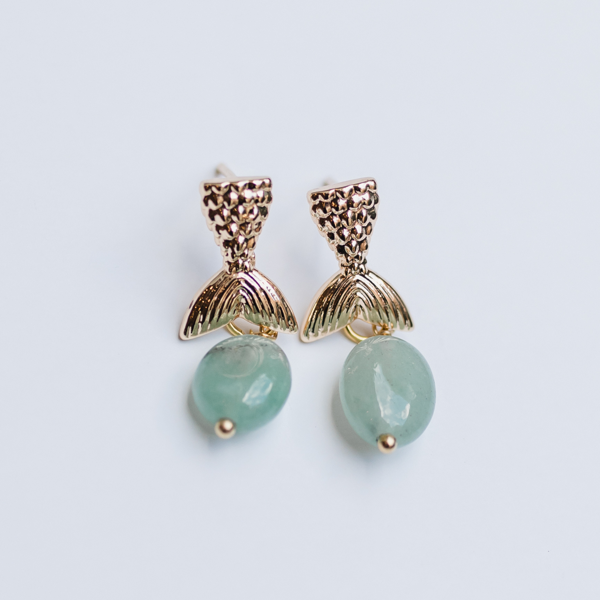 Gold mermaid tail with green stone drop earring