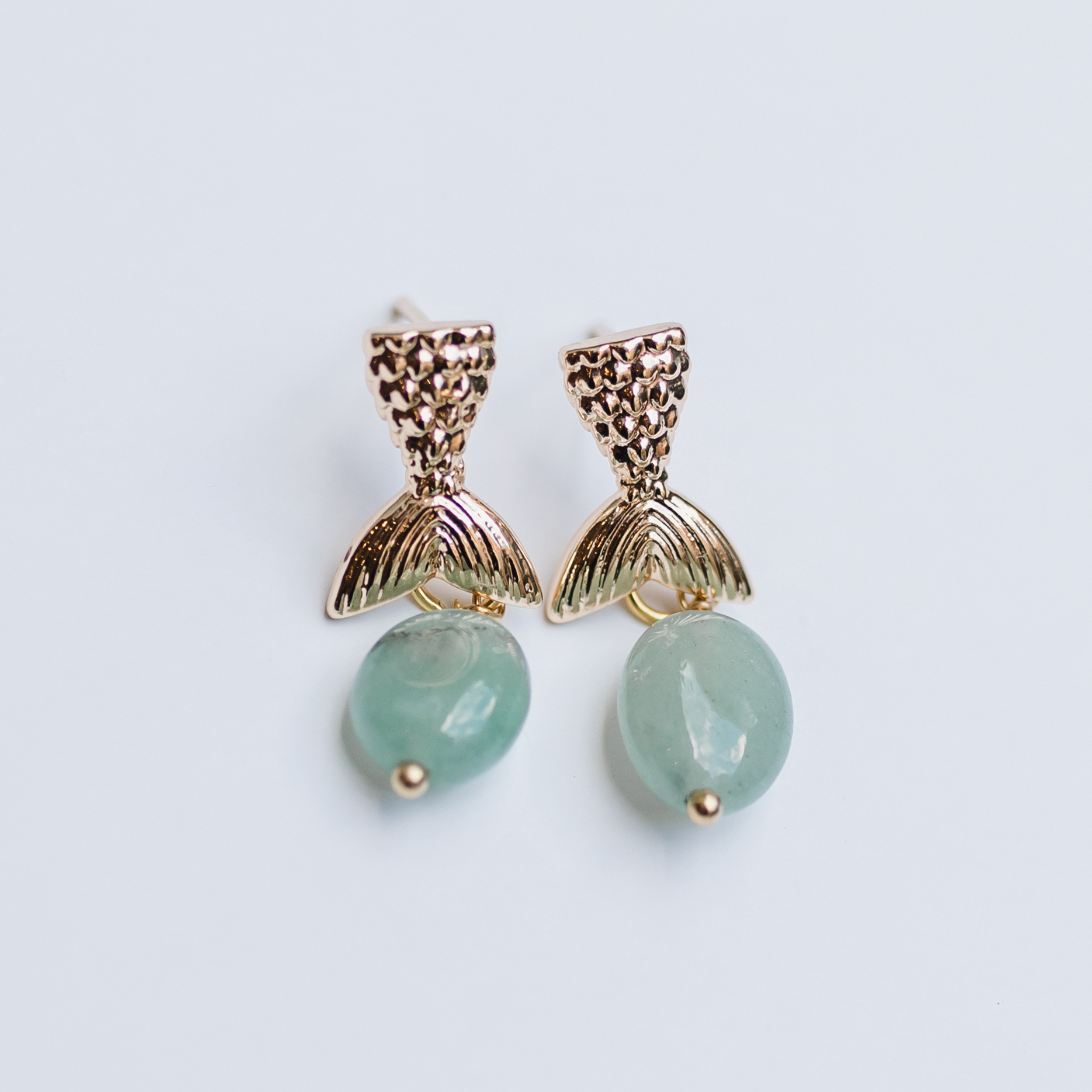 Gold mermaid tail with green stone drop earring