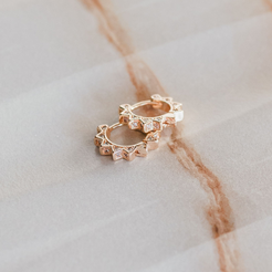 gold spiky huggie hoops with CZ