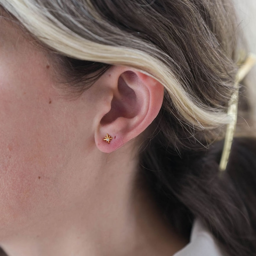 gold starburst earrings 