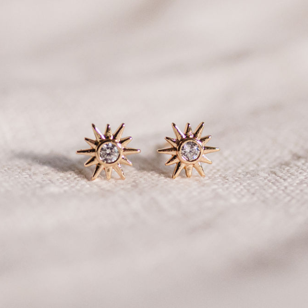 Gold Sun shaped stud earrings