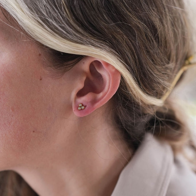 three stone stud earrings 