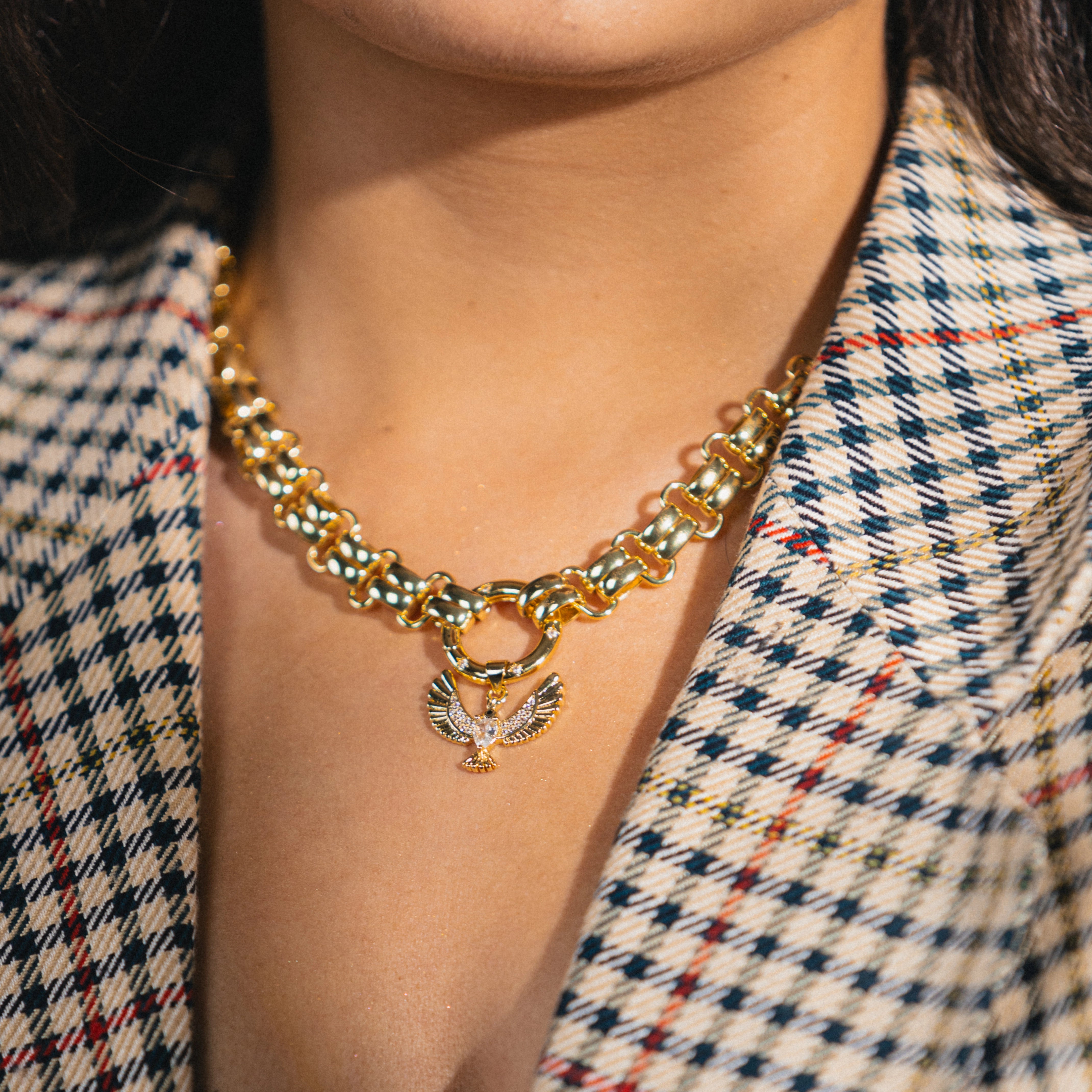 mable and gold bird charm