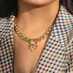 mable and gold bird charm