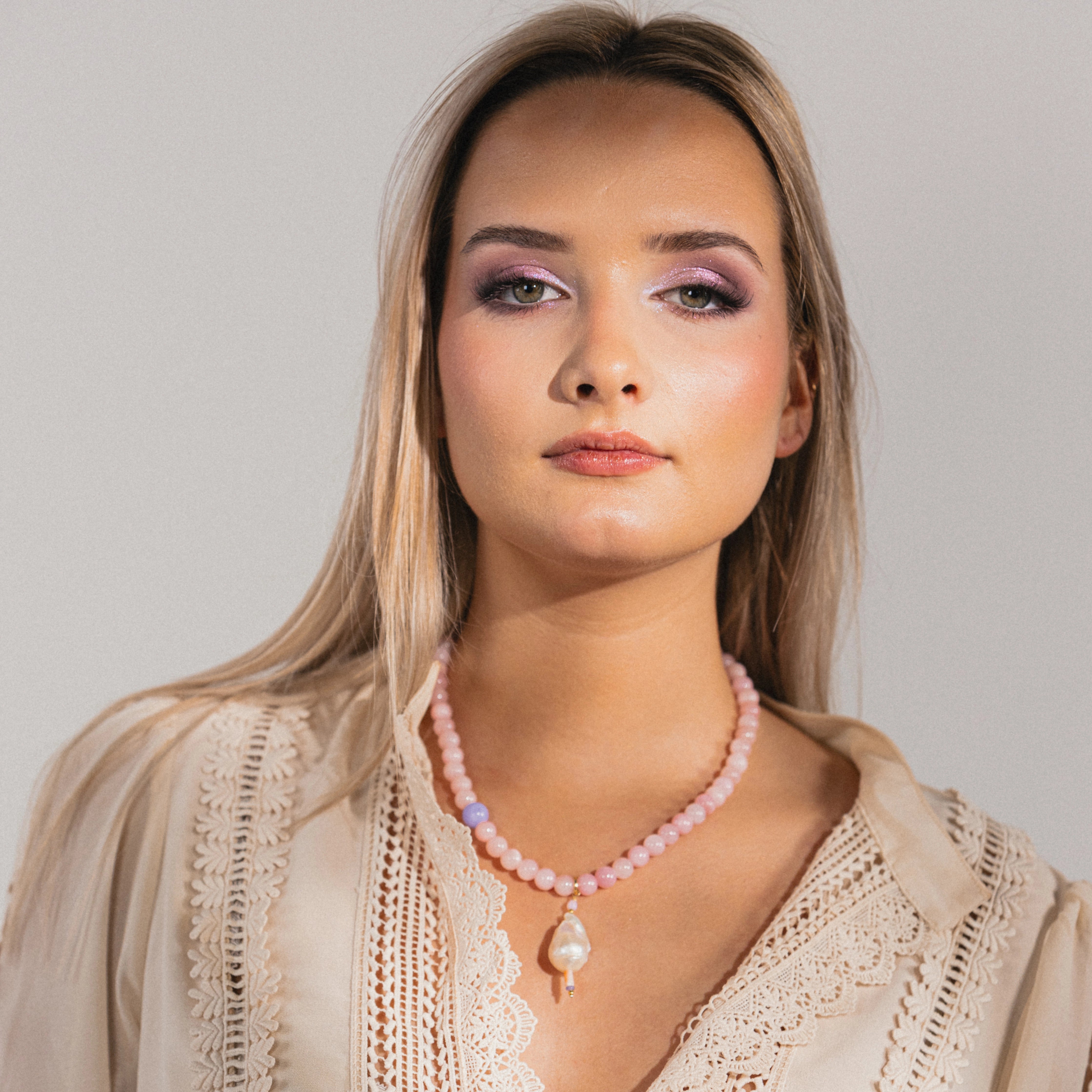 gemstone necklace with rose quartz and pearl pendant 