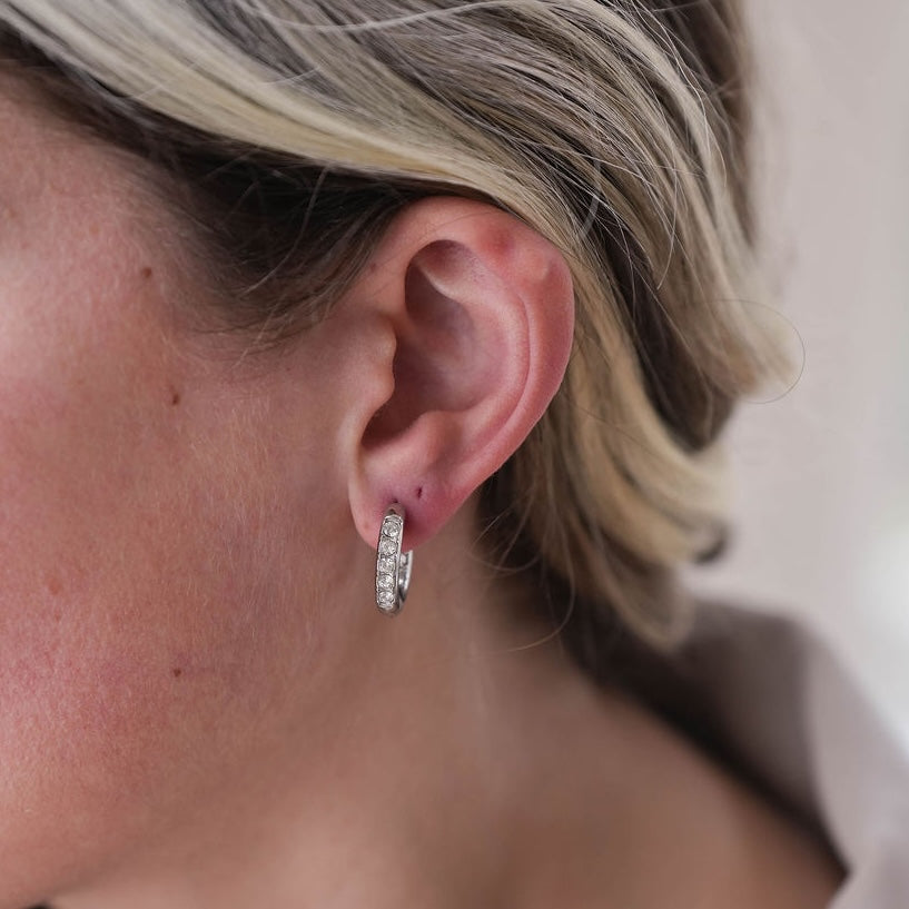 silver hoop earrings displayed 