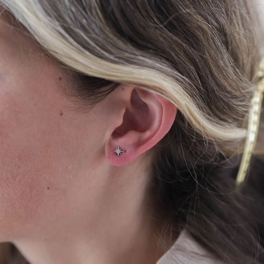 silver starburst stud earrings 