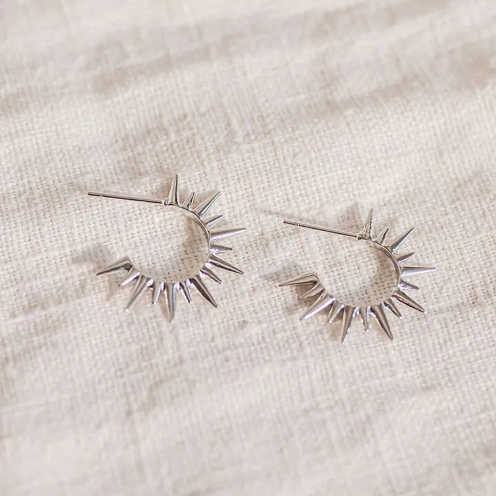 Silver spikey hoops