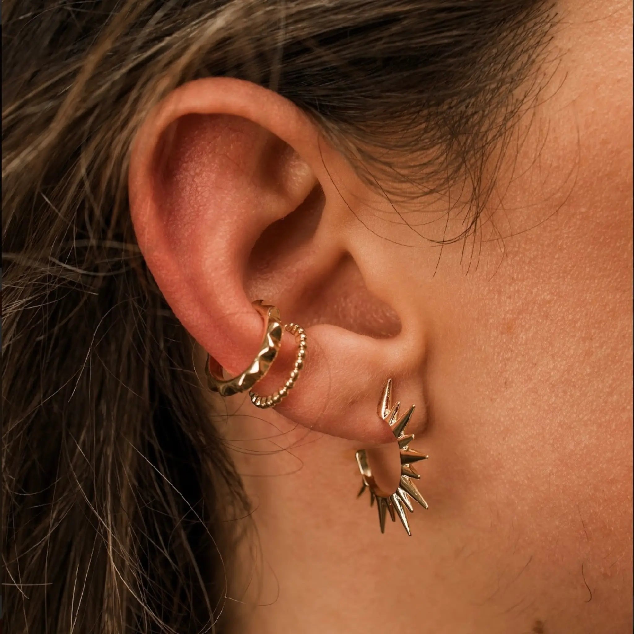 Gold spikey hoops