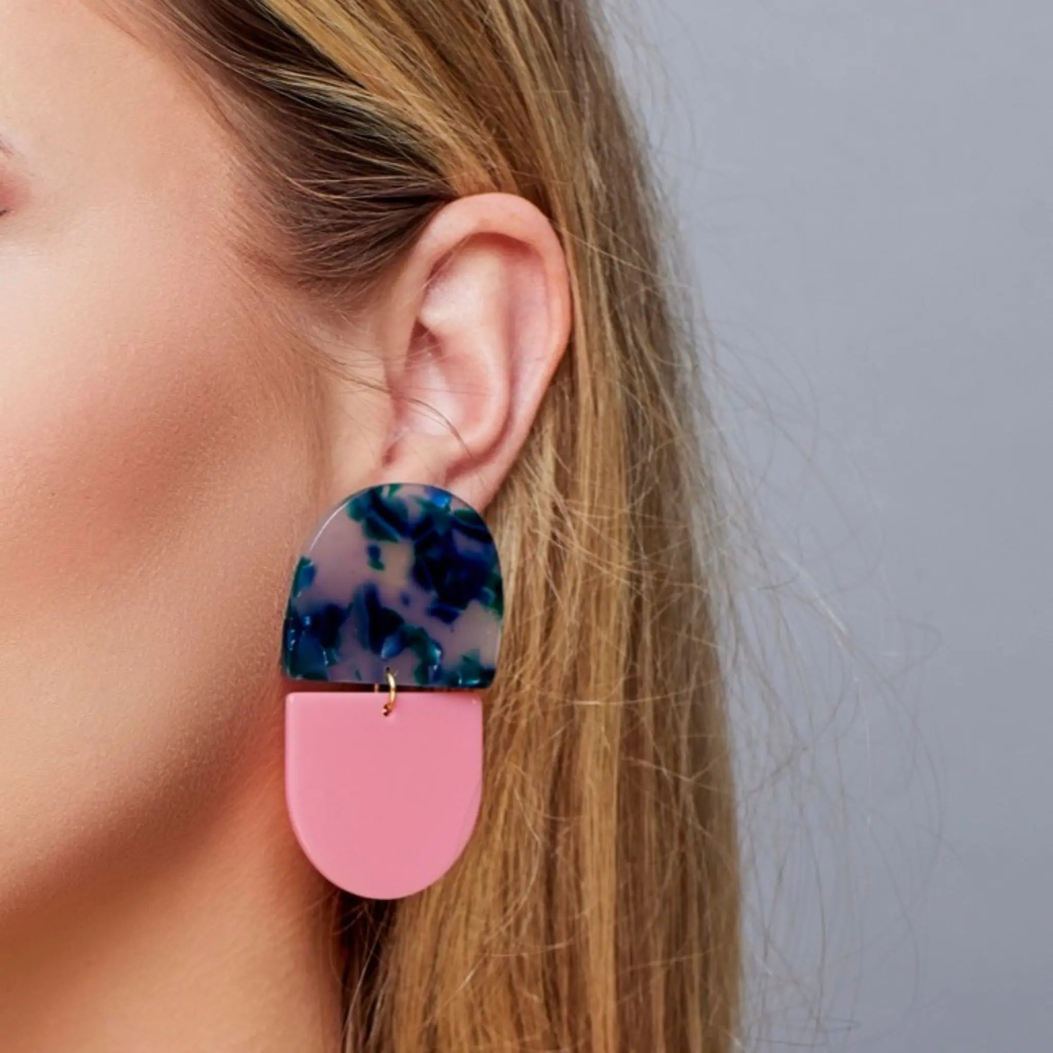 pink and blue geometric statement earrings